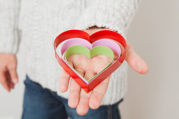 Image showing Heart symbols held in hand