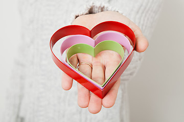 Image showing Heart symbols held in hand