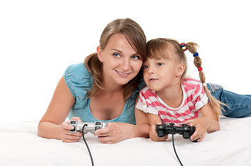 Image showing Happy family playing a video game