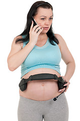 Image showing Pregnant with headphones