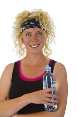 Image showing Woman holding bottle of water