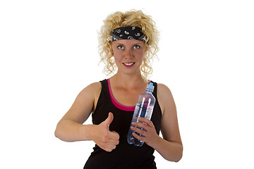 Image showing Woman holding bottle of water