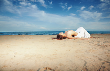 Image showing Topless at the beach