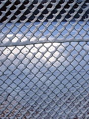 Image showing Snow on a fence