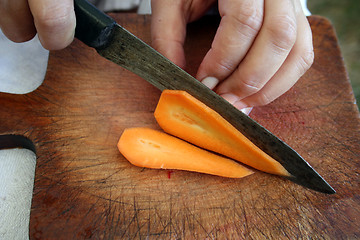 Image showing Carrots during preparation for cutting