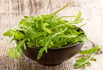 Image showing Rucola in black bowl