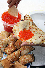 Image showing Russian pancakes with caviar of fish - national tradition