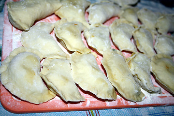 Image showing Made fruit dumpling with stewed cabbage