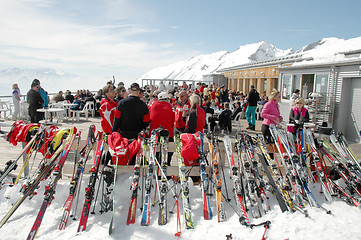 Image showing Skiers at mountain top