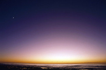 Image showing Sunset with moon