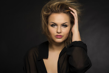 Image showing Beautiful woman with a windblown hairstyle