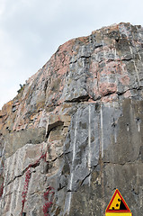 Image showing road sign waring about falling stones