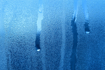 Image showing Frozen water drops on window glass