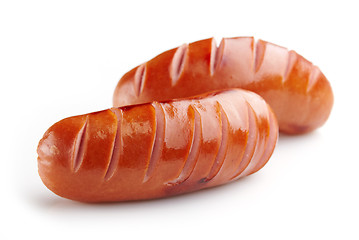 Image showing grilled sausages on white background