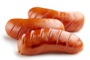 Image showing grilled sausages on white background