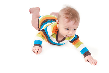 Image showing Little baby in multicolored striped clothes