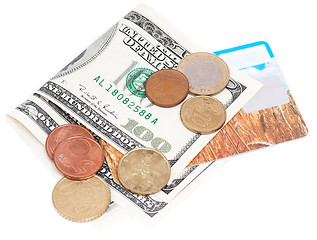 Image showing Coins over bills