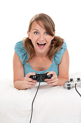 Image showing Happy family playing a video game