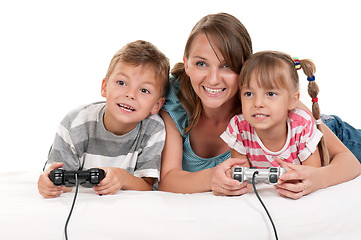 Image showing Happy family playing a video game