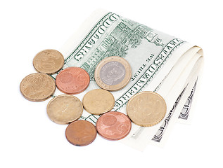 Image showing Coins over bills