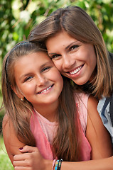 Image showing Happy sisters