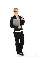 Image showing Professional woman giving a thumbs up