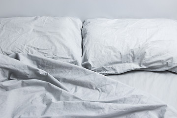 Image showing Gray bed linen