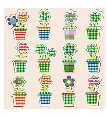 Image showing A set of colorful pots of flowers