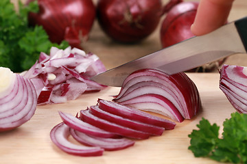 Image showing Cutting onions