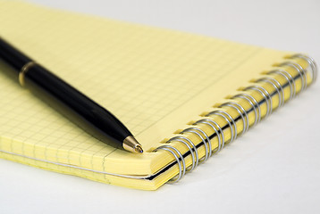 Image showing Black ballpoint pen and notebook 