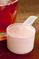 Image showing pomegranate powder and juice