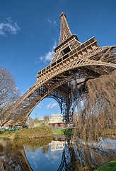 Image showing Wonderful wide angle view of Eiffel Tower with lake and vegetati