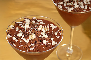 Image showing Chocolate pudding with chocolate curls in martini glasses