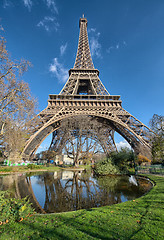 Image showing Wonderful wide angle view of Eiffel Tower with lake and vegetati