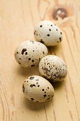 Image showing quail eggs on kitchen table