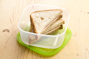 Image showing ham sandwich in plastic box