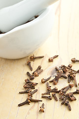 Image showing cloves on kitchen table