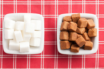 Image showing brown and white cubes of sugar