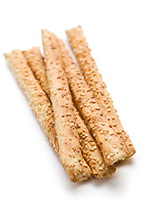 Image showing grissini sticks with sesame seeds