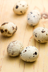 Image showing quail eggs on kitchen table