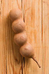 Image showing tamarind on wooden table