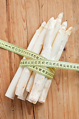 Image showing white asparagus and measuring tape