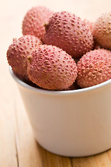 Image showing tasty litchi fruit in ceramic bowl