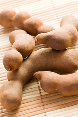 Image showing tamarinds on kitchen table