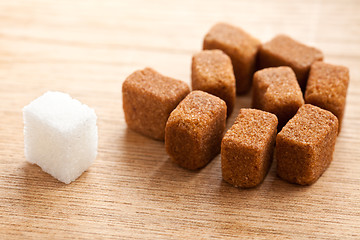 Image showing brown and white cubes of sugar