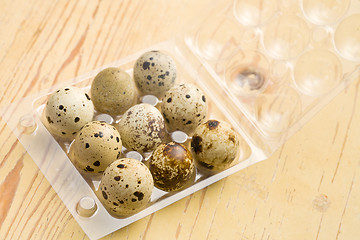 Image showing quail eggs on kitchen table