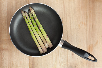 Image showing asparagus on pan