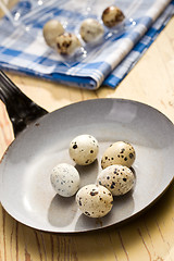 Image showing quail eggs on kitchen table