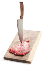 Image showing raw beef steak and knife