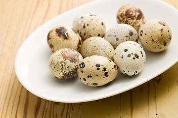 Image showing quail eggs on kitchen table